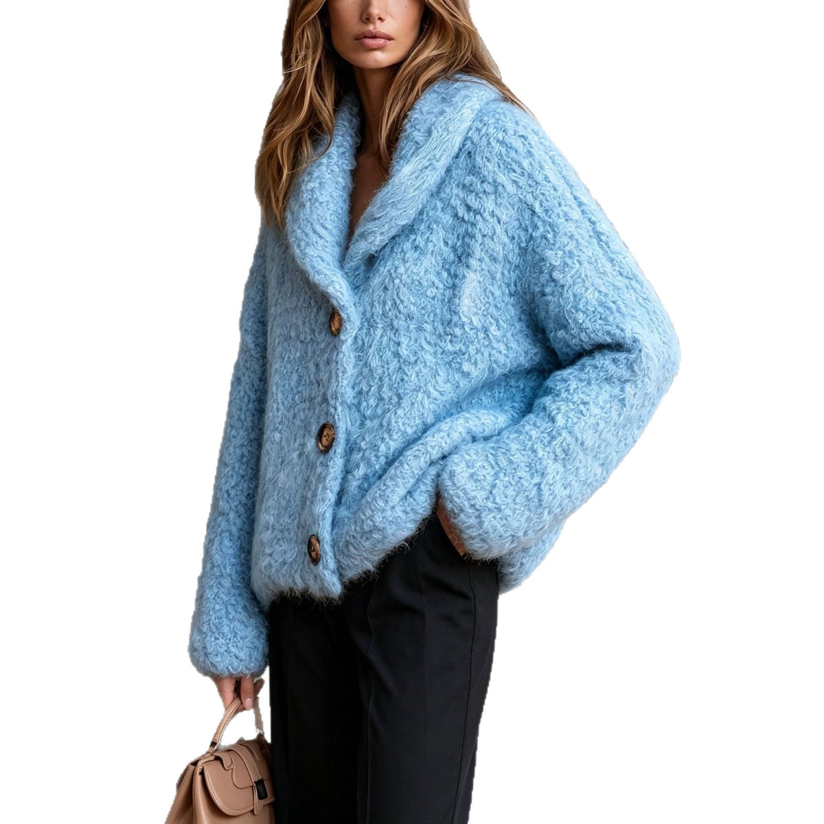 Model wearing a light blue faux shearling button jacket